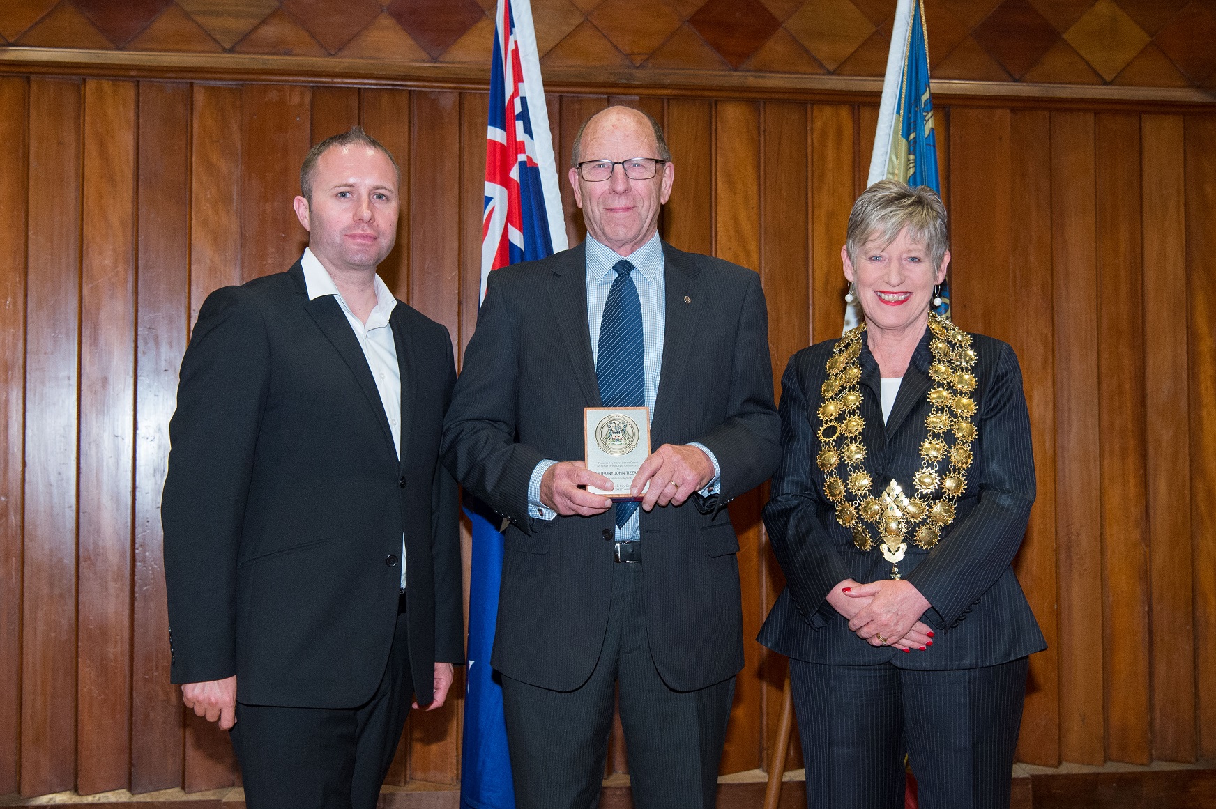 Anthony Tizzard receiving his award