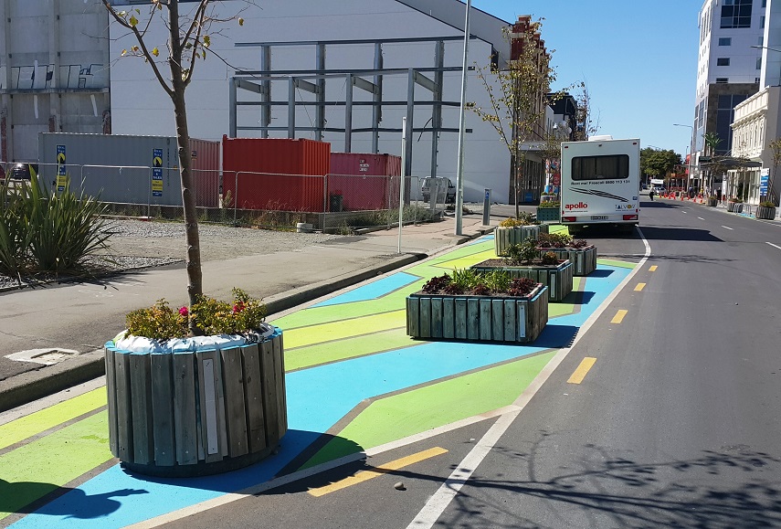 Planters and paint used to narrow a road