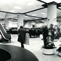 Main foyer of the Tuam Street Civic Offices shortly after its official opening, 1980 Note: the BNZ hexagonal table being used. This piece of furniture was recently conserved and is currently being used in the main reception area of the Archives Reading Room at Recall