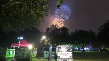 Fireworks above recycling bins