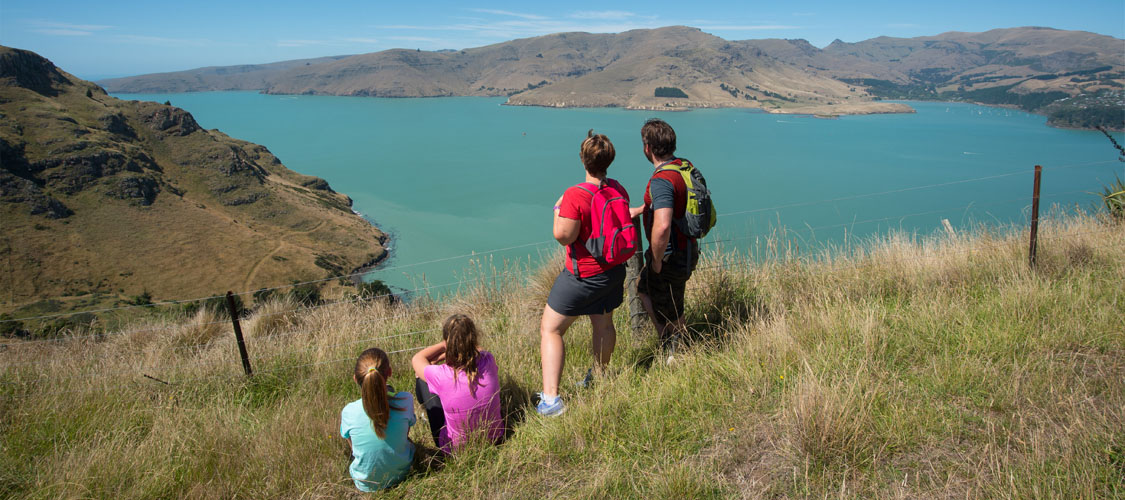 Family on Crater Rim above Evans Pass