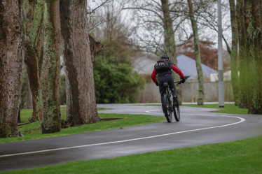 Man cycling on the Northern Line cycleway.