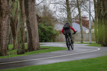 Man cycling on the Northern Line cycleway.