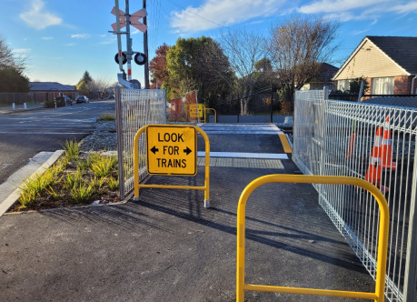 Look for trains signage at a railway crossing